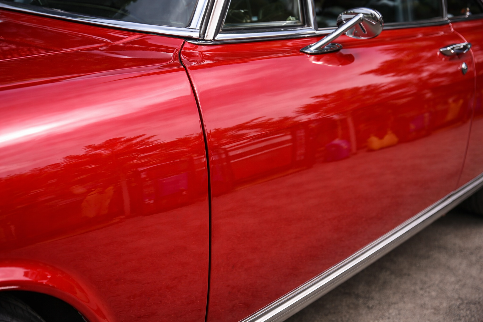 Spray booth shot / wet coat close-up / reflection finish